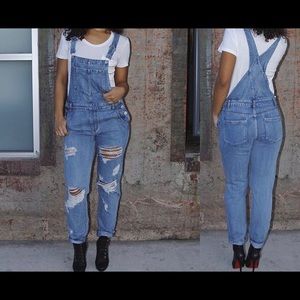 Never worn distressed overalls.